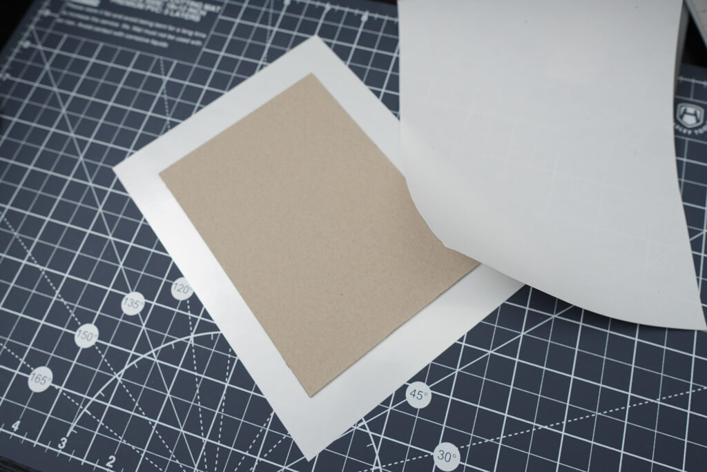 sticking vinyl to sketchbook cover