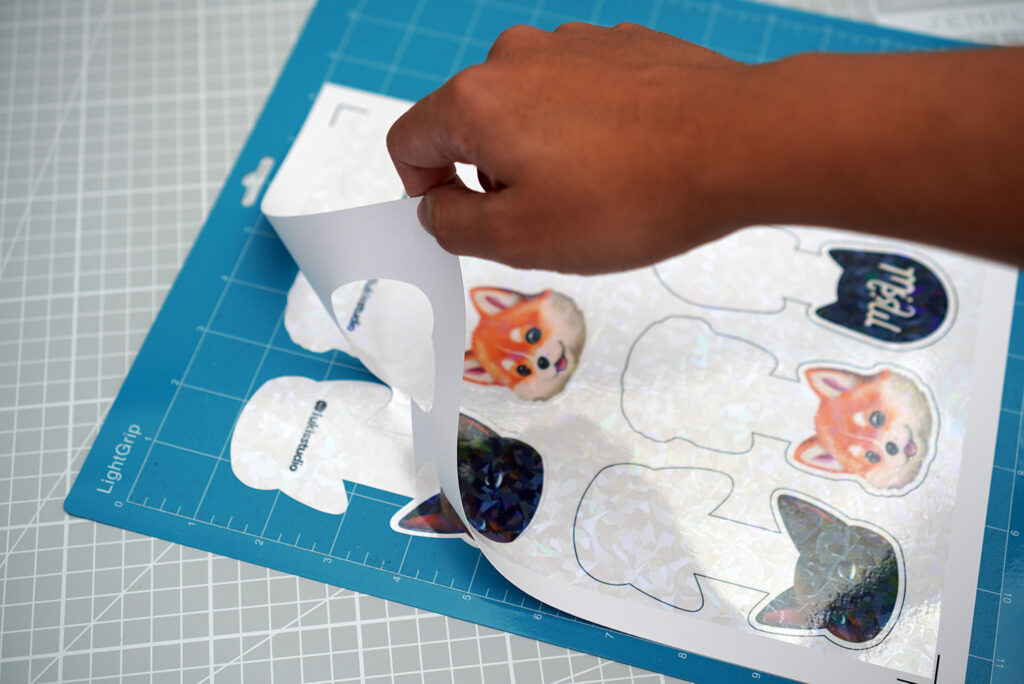 unload paper from cutting mat