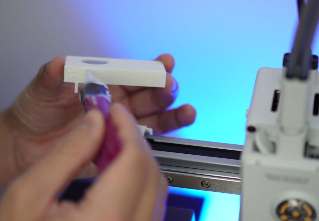 use super glue to stick remote holder onto the mount